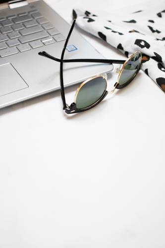 Stock photo black and white desk and notebook