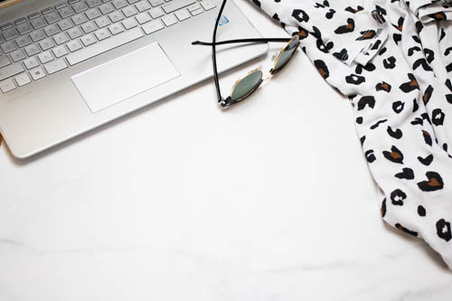 Stock photo black and white desk and notebook