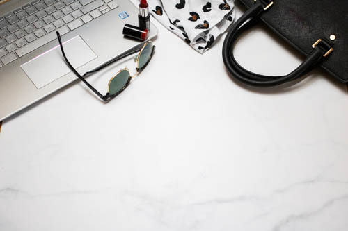 Stock photo black and white desk and notebook