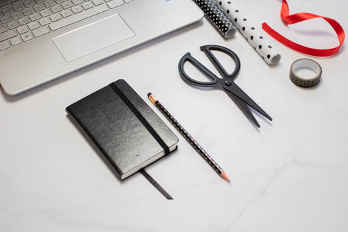 Stock photo black and white desk and notebook